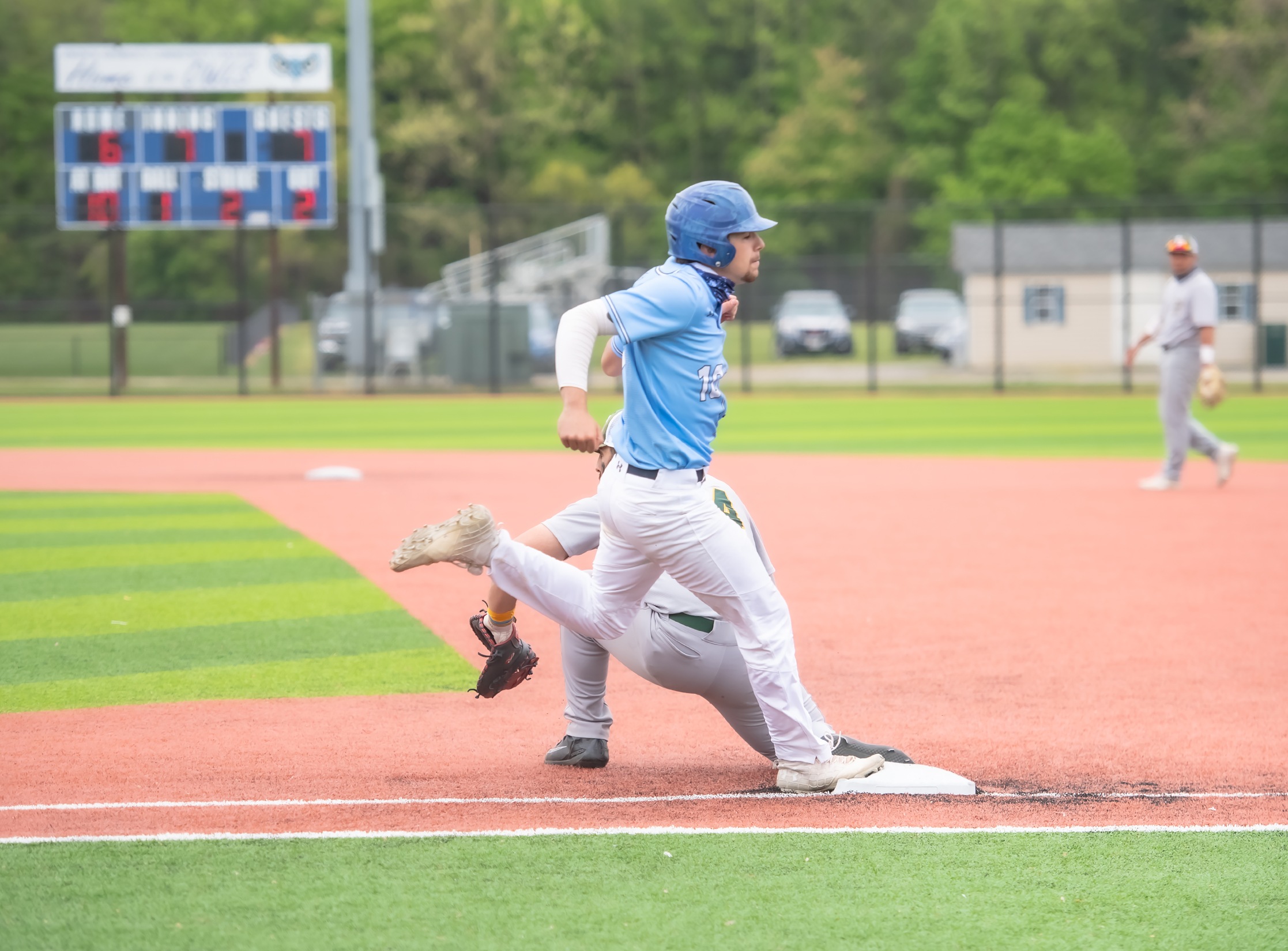 Grayson Lewis (10) beats the throw at first in the bottom of the seventh-inning on Saturday, April 24th against the Frederick Cougars. Lewis would go on to score the winning run on Saturday afternoon as the Owls topped the Cougars, 8-7.